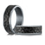 Close-up view of The Umbrium showing hammered carbon fiber faceted texture and tantalum rails