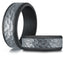 Close-up view of The Shadowline showing hammered titanium texture and black tantalum contrast